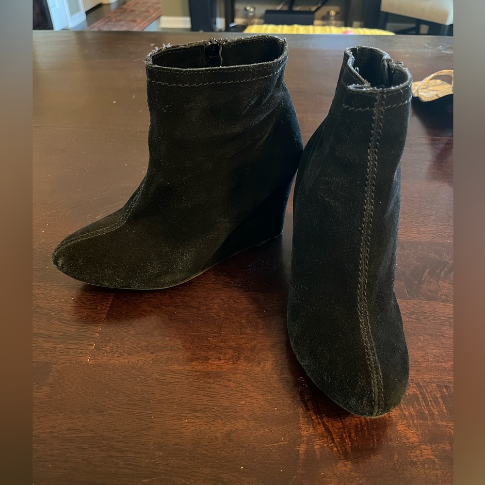 Women’s size 8.5 Black Leather Wedge Bootie.